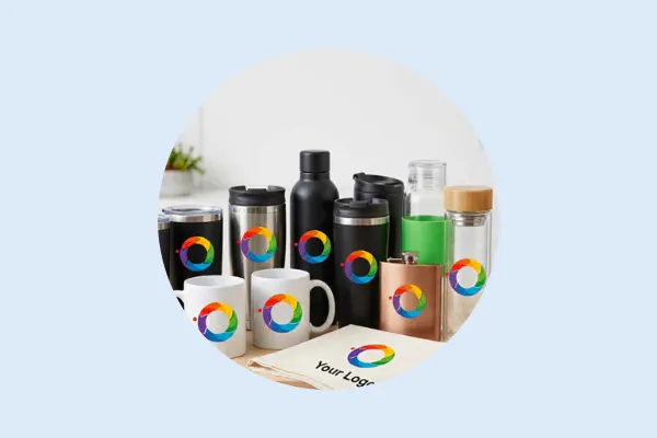 Branded promotional drinkware including tumblers mugs bottles and a flask featuring a colorful logo