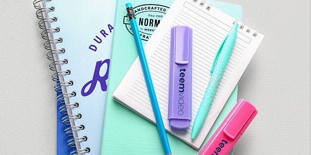 pens highlighters and notebooks