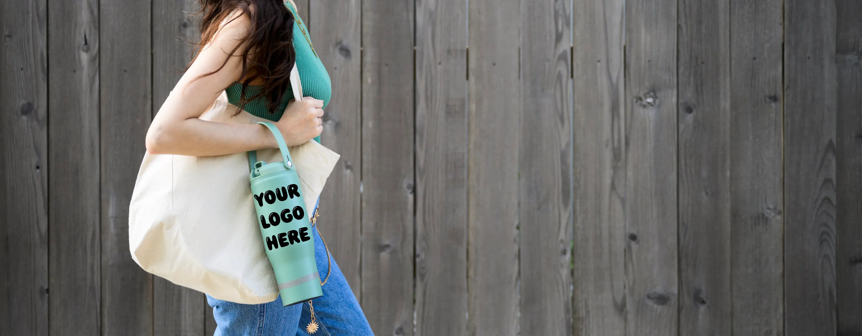 woman walking with logoed water bottle