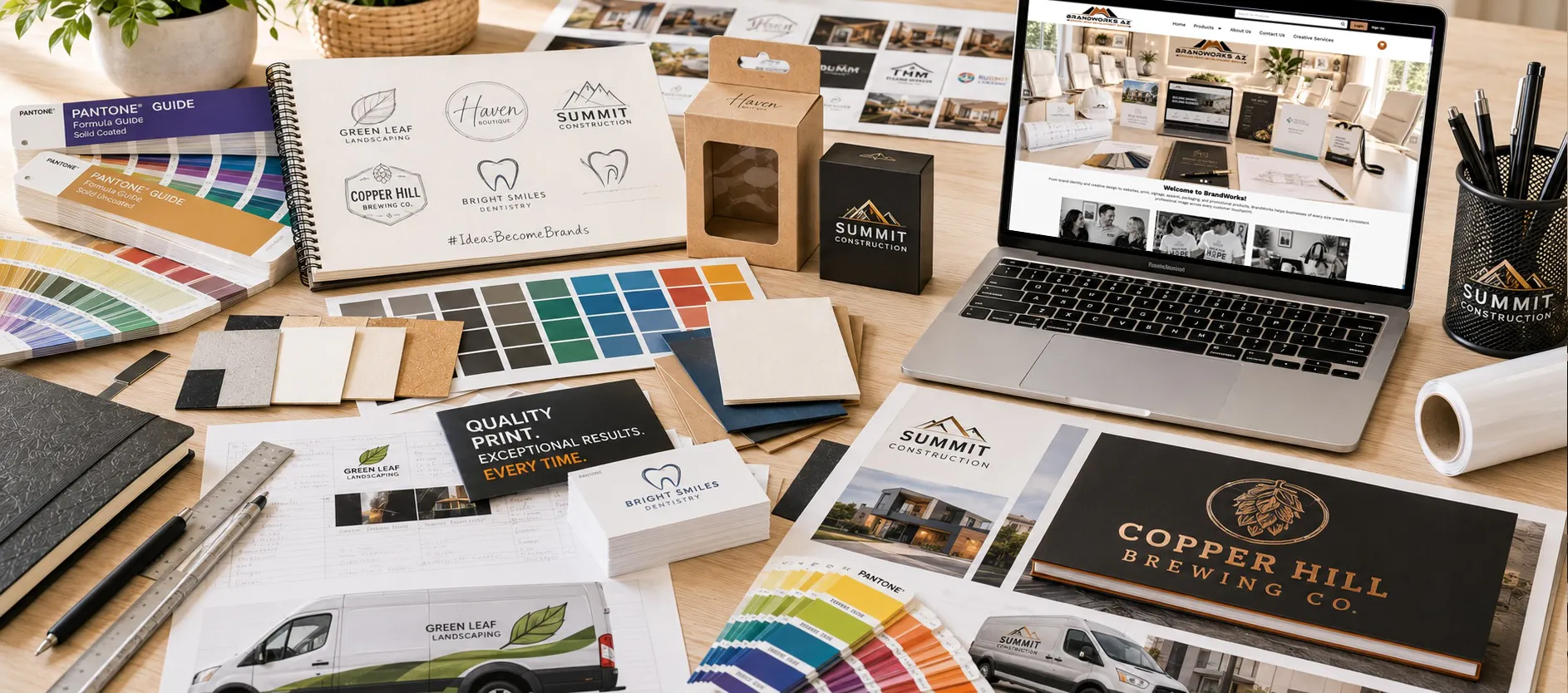 Creative branding workspace with logo concepts packaging print samples color swatches and website design