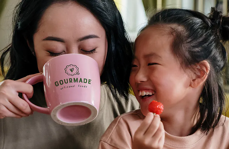Woman and child with drinkware