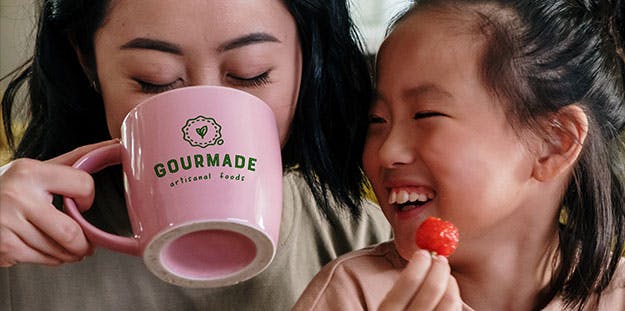 mom drinking coffee with daughter