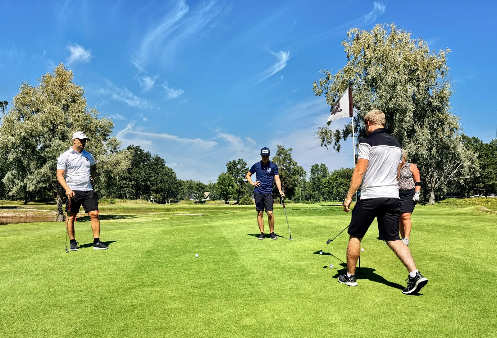Men playing golf