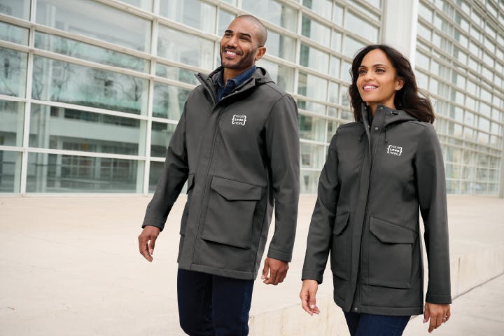 Man and woman walking side by side in jackets