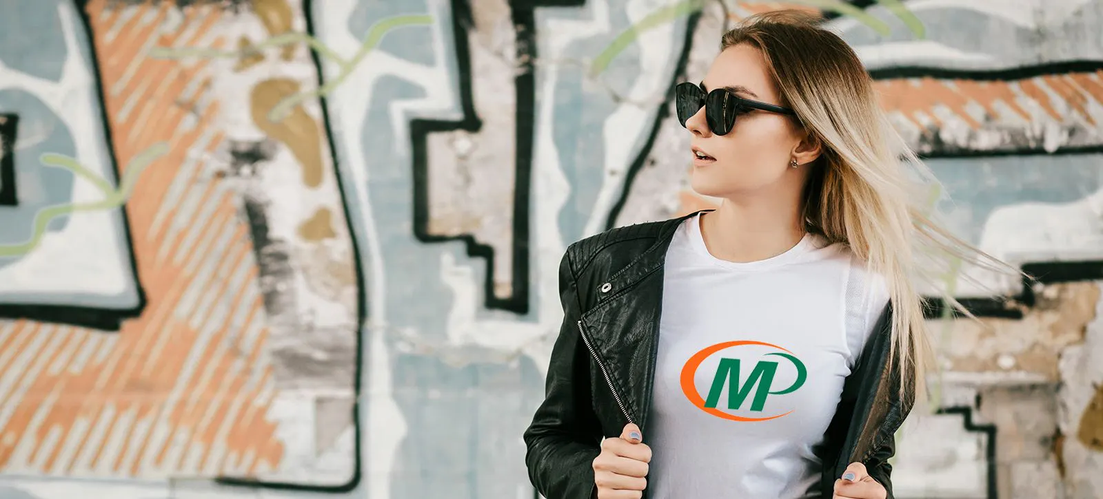 woman with logoed tshirt and jackt