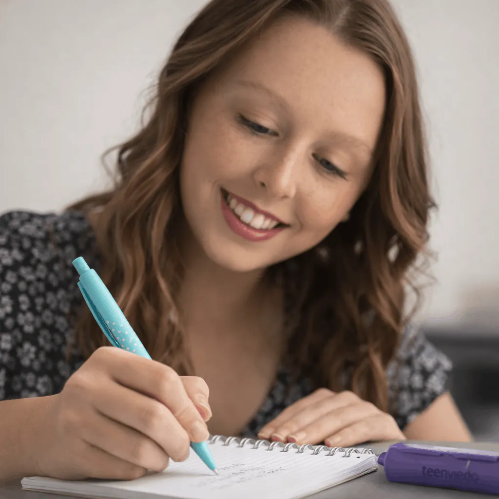 pens highlighters and notebooks