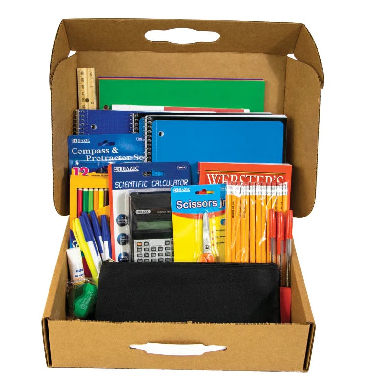 A teachers desk full of first day supplies