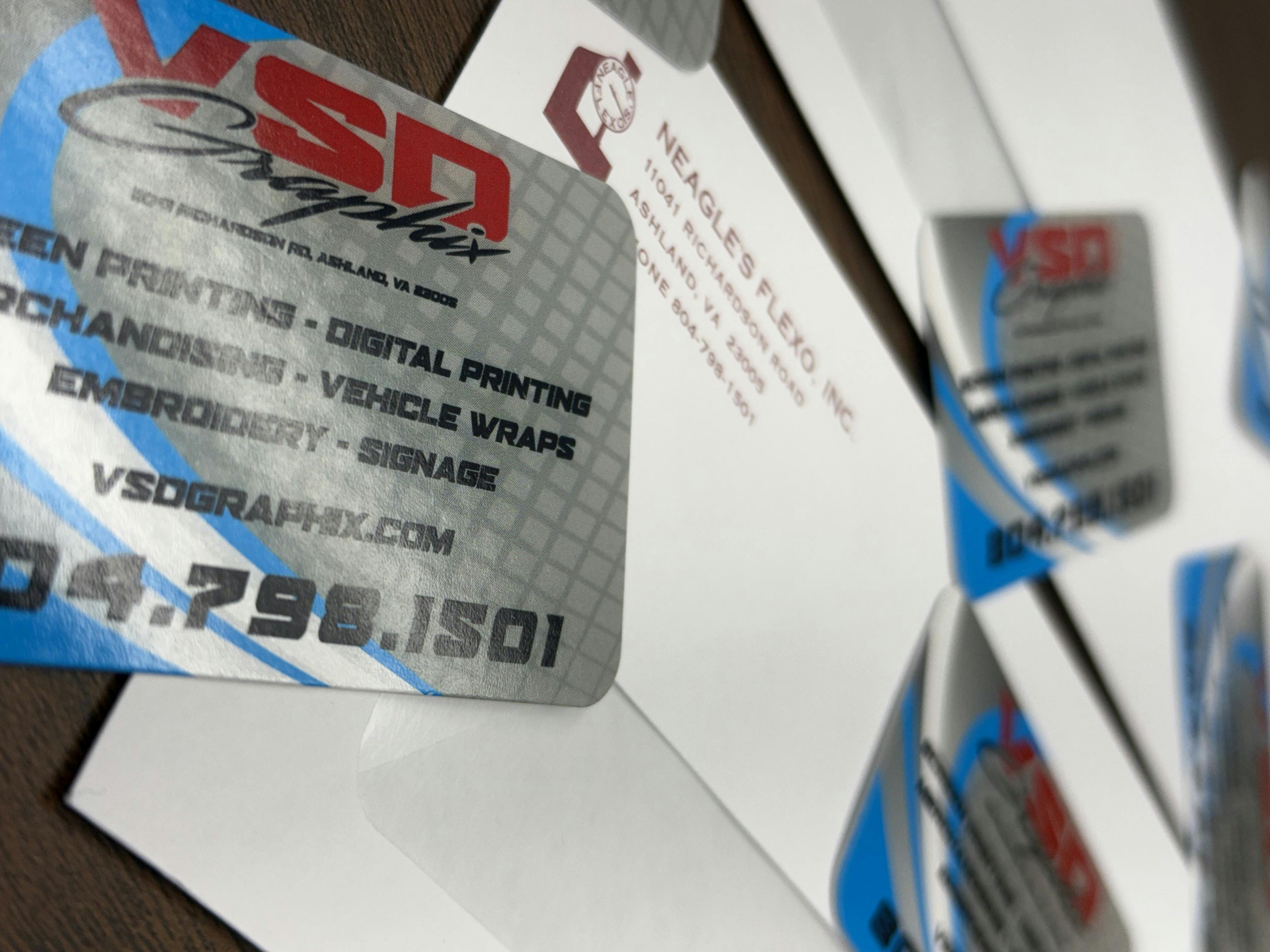 close up of branded business cards and envelopes