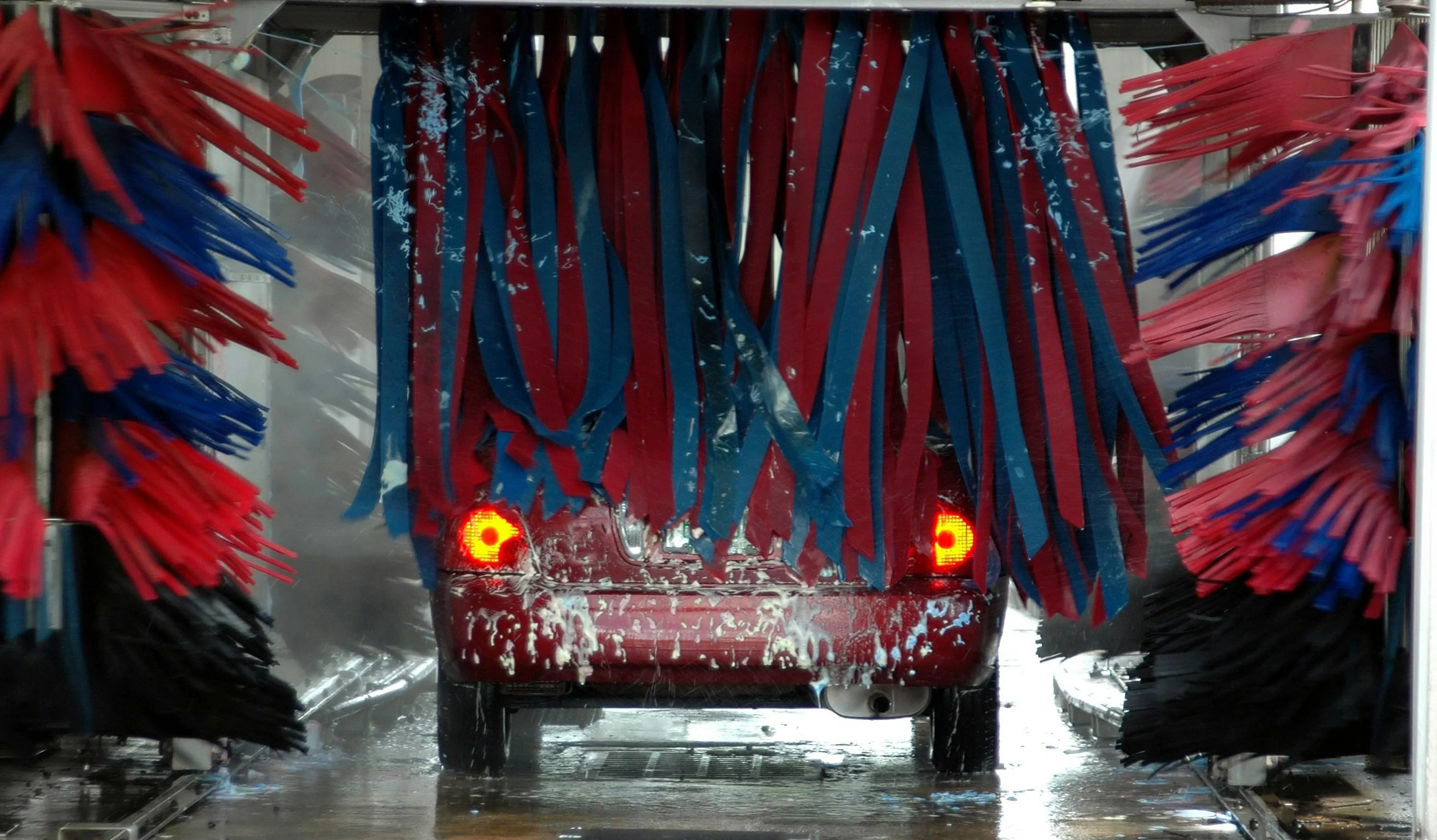 Car driving through car wash