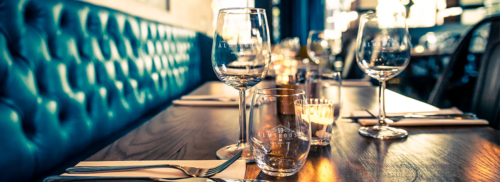 Restaurant booth with wine glasses