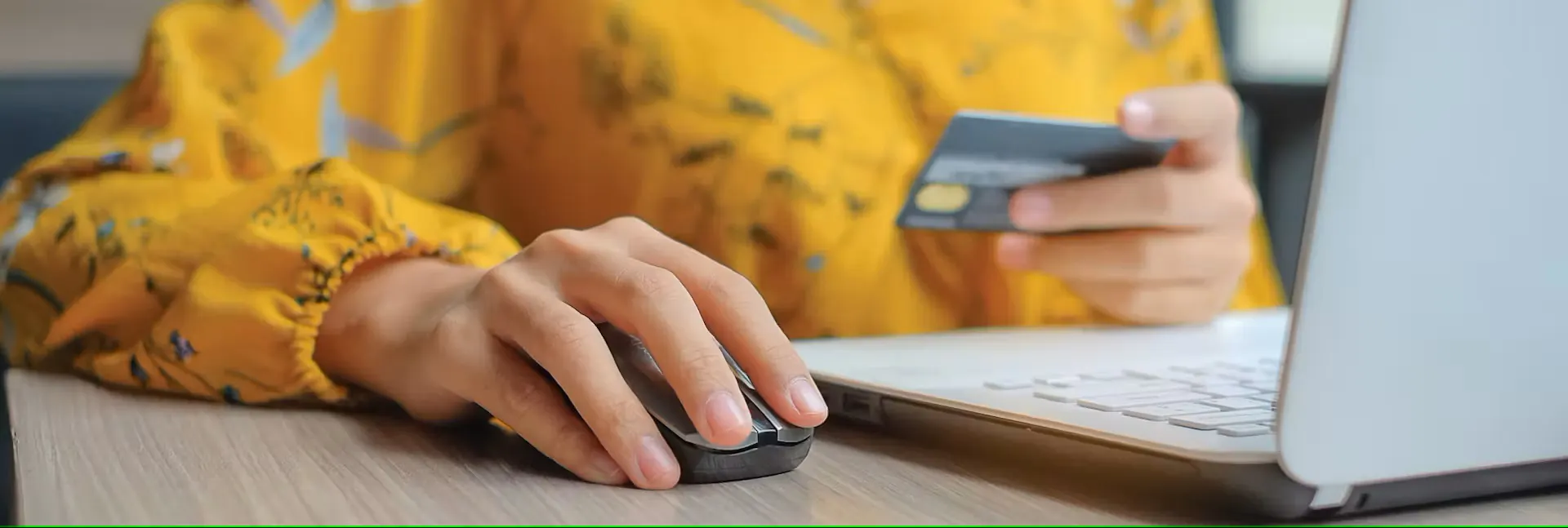 woman using eCommerce website on laptop
