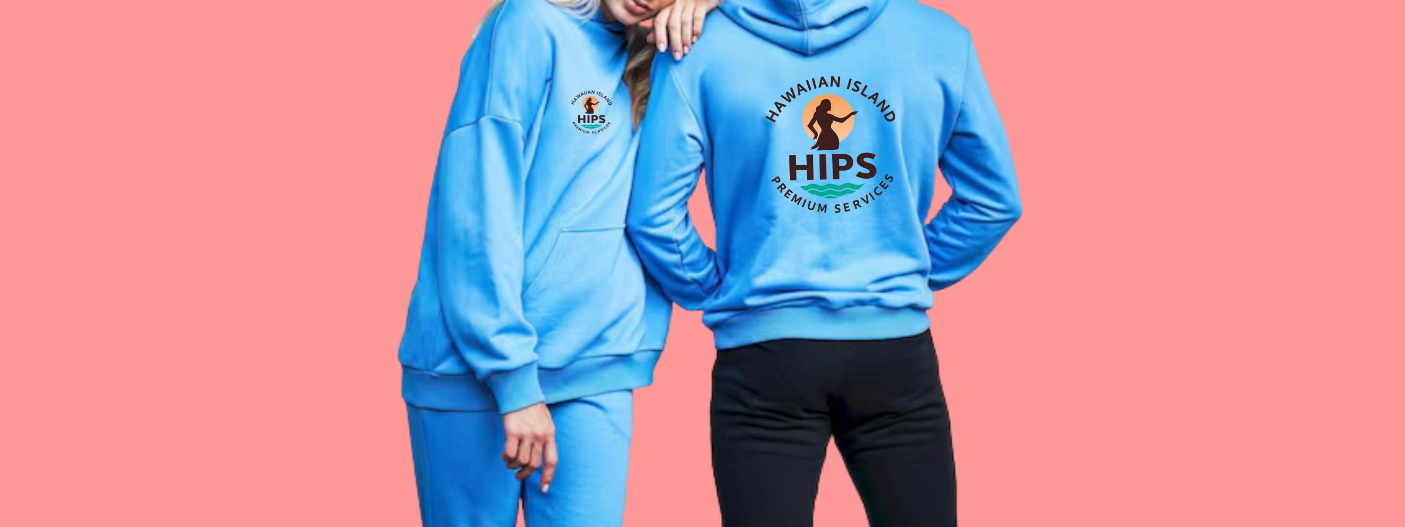 Two people wearing red and coral sweatshirts on a blue background 