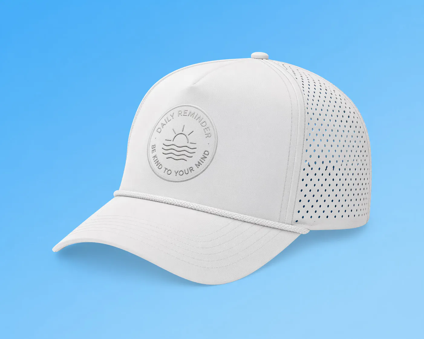 Black and white trucker hat on light blue background