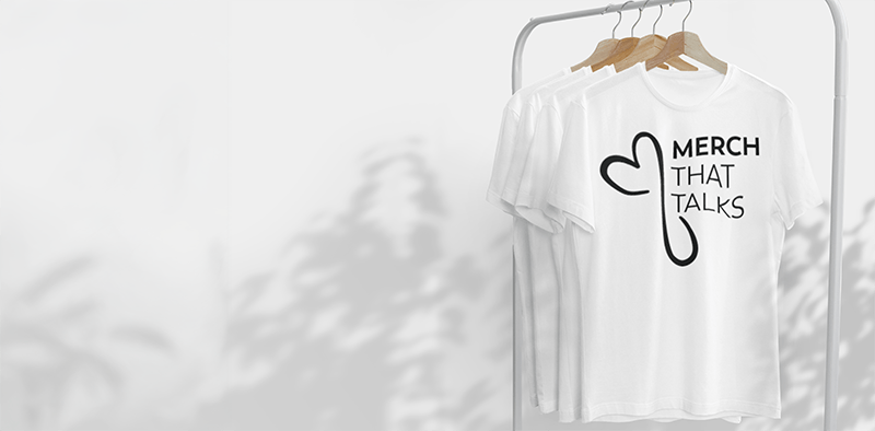 mockup-of-a-hanging-t-shirt-featuring-tree-shadows-in-the-background-3724-el1