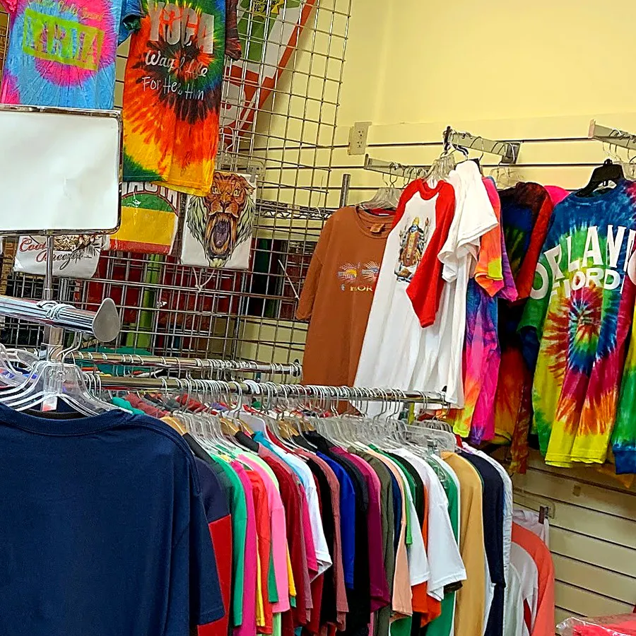 Racks of printed and tiedye shirts inside our Orlando shop