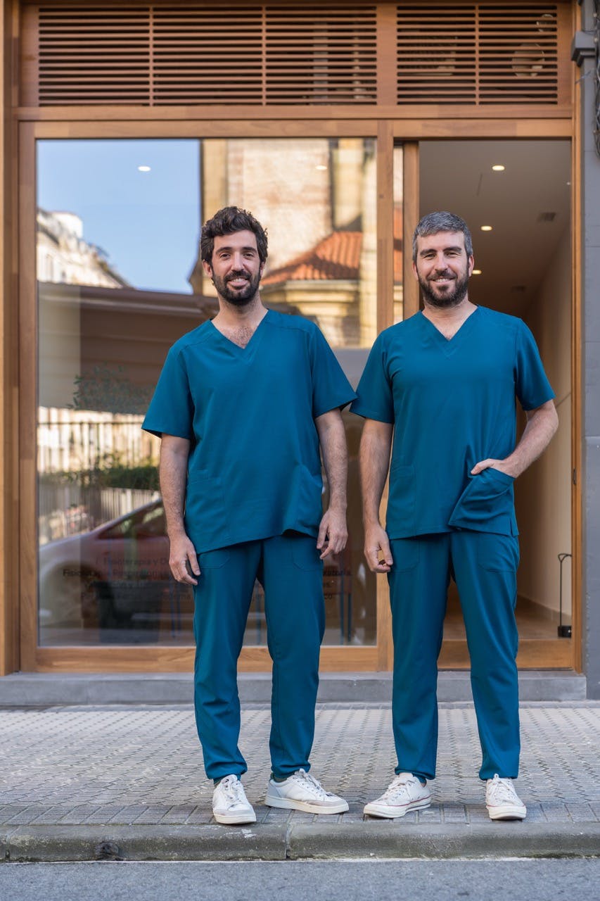 Young medical professionals in matching scrubs