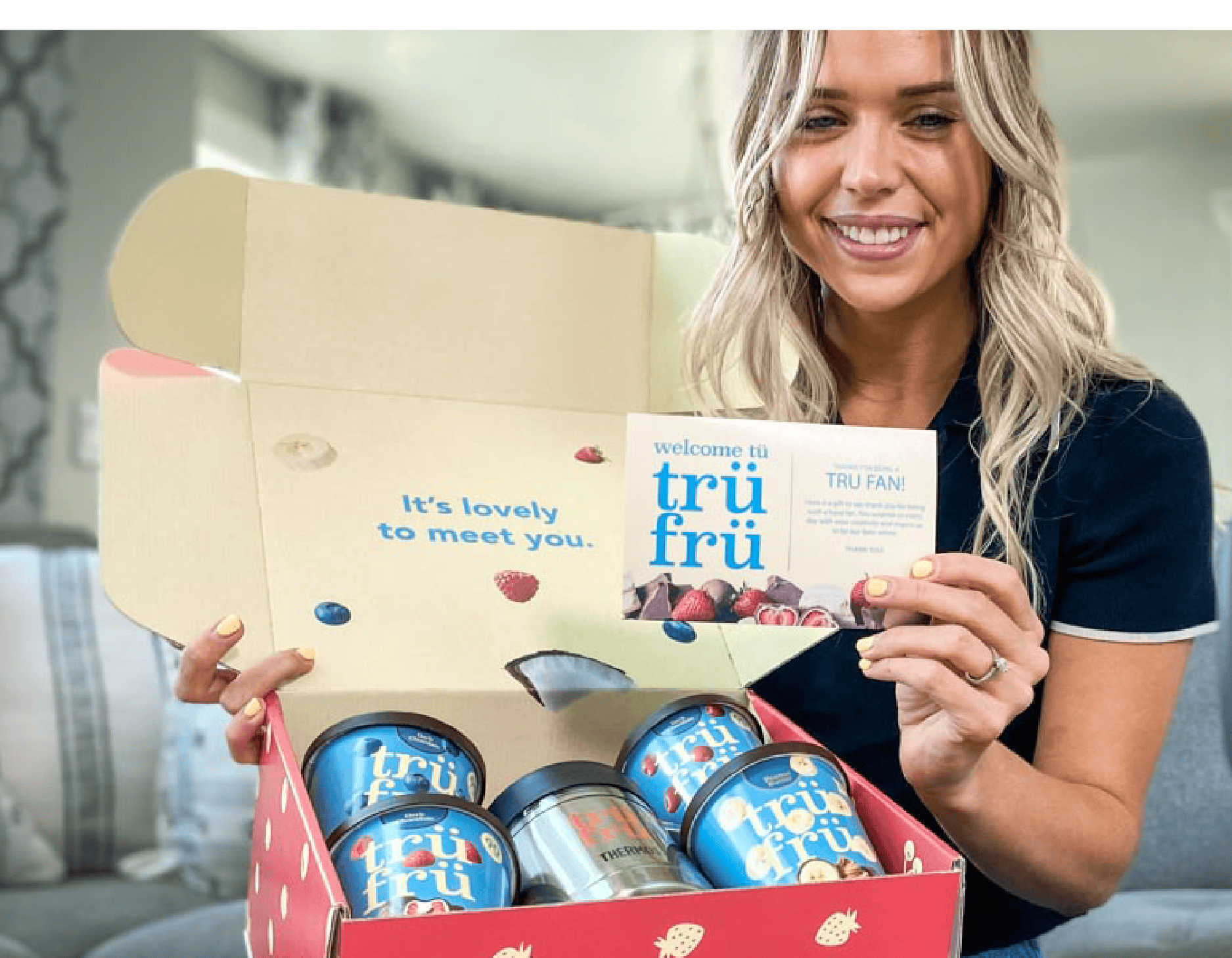 a woman showing her customized employee appreciation box