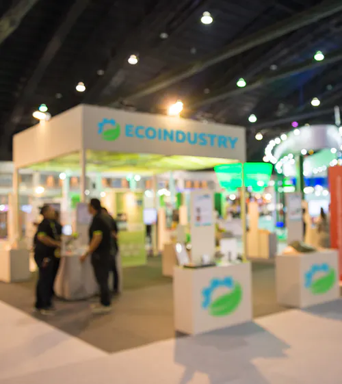 people walking around a tradeshow