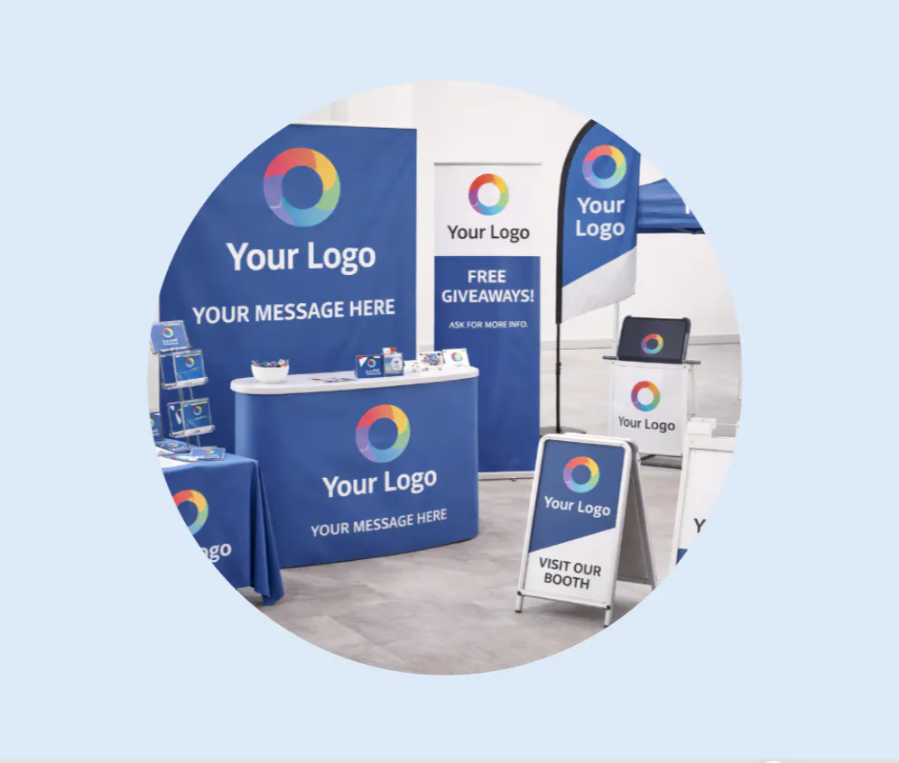 Branded trade show displays and event signage featuring a colorful circular logo