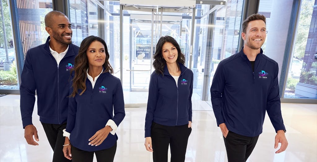 fouF people walking with corporate apparel