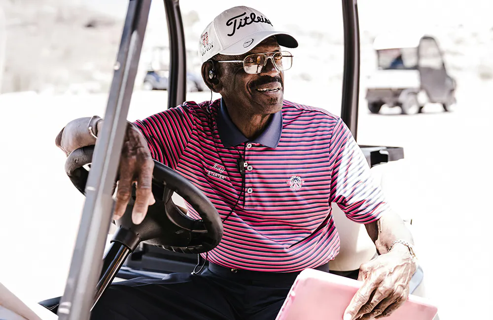 man in logoed golf polo