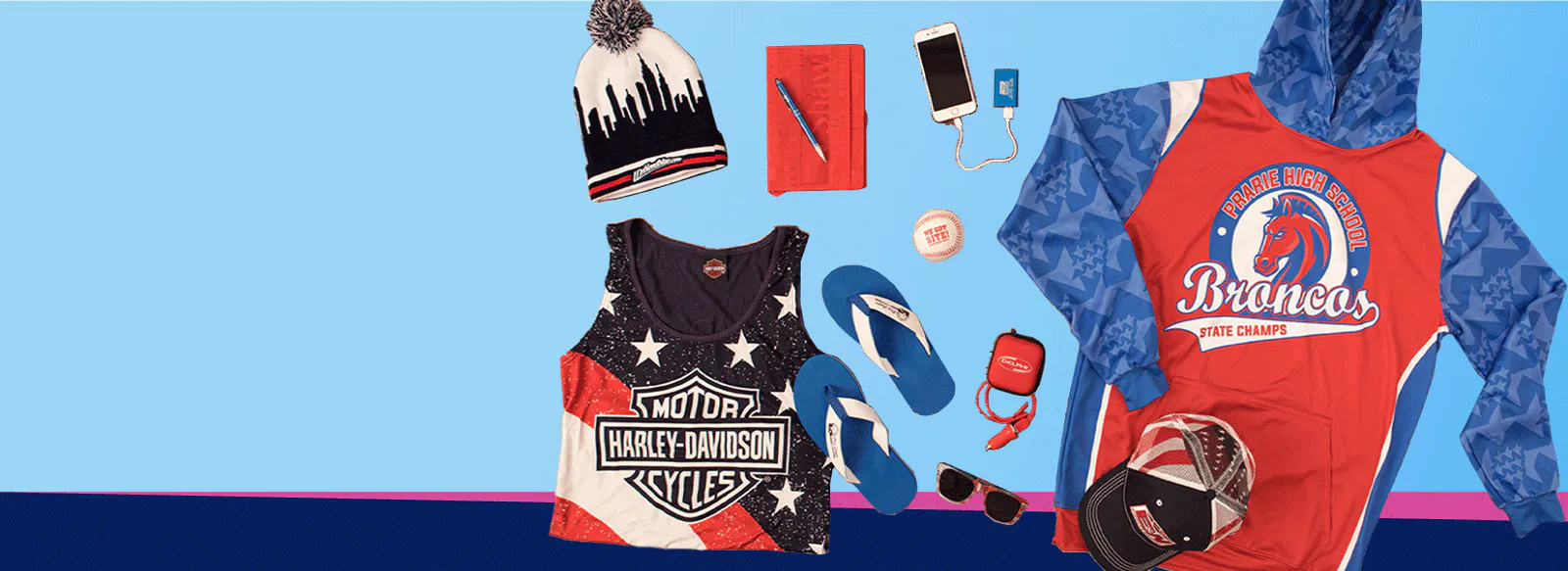 Promotional products like beanies, tanktops, sandles, pens, notebooks, and technology with a red, white, and blue theme