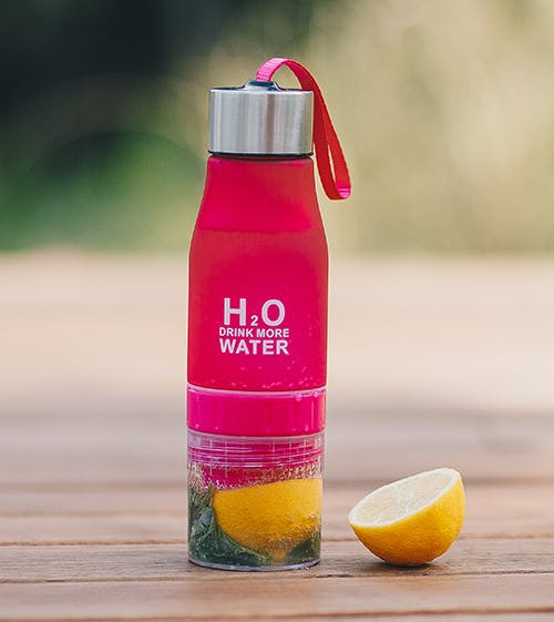 pink water bottle with lemons