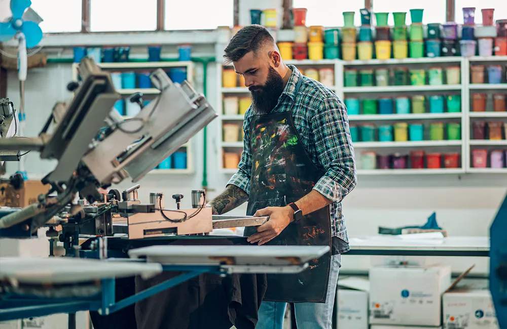 a man silk screening