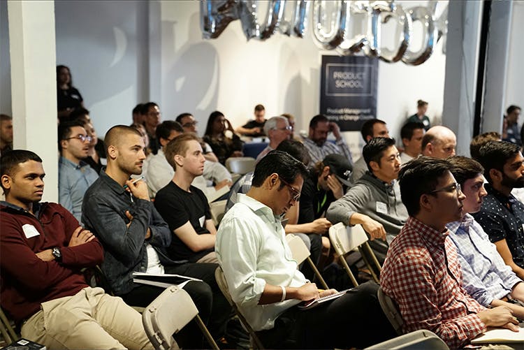 employees sitting at a meeting