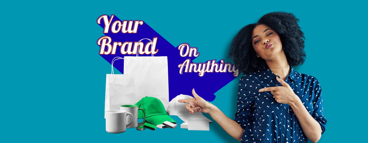 Marca Printing and Marketing staff member pointing at promo package bundle 