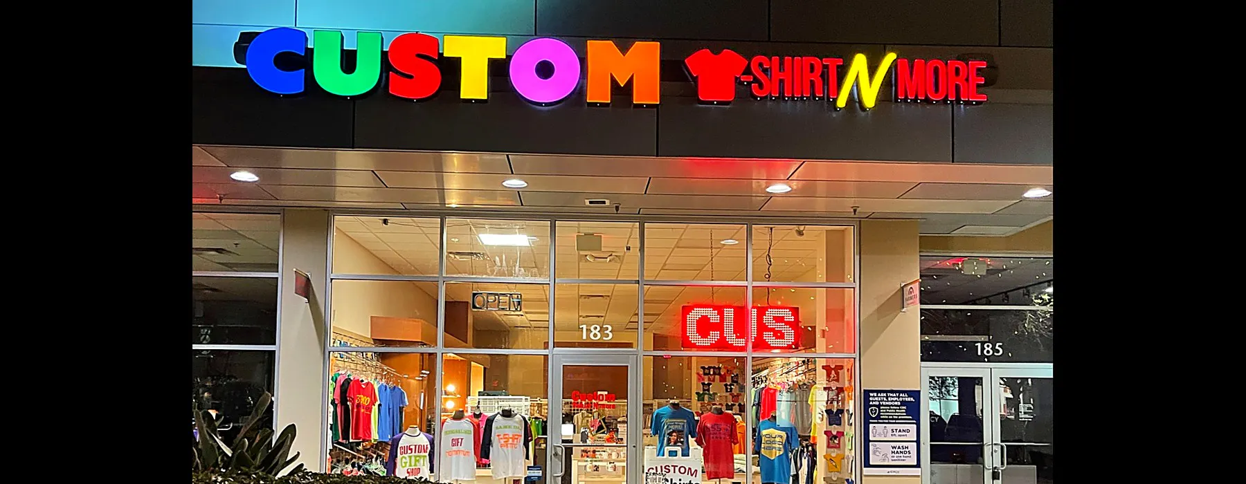 Our shop front on West Crystal Lake Street in Orlando, lit up at night