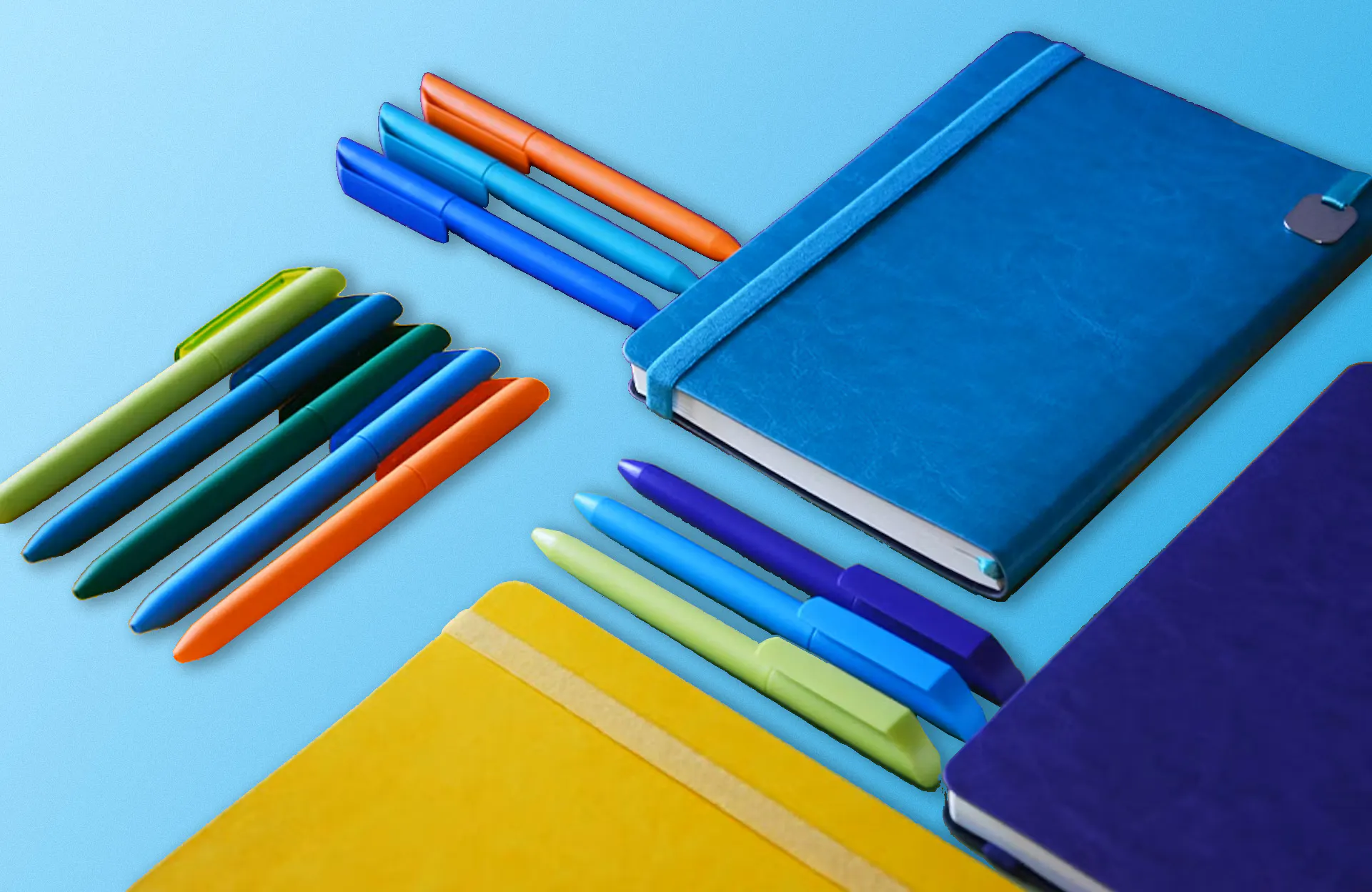 colorful pens and notebooks