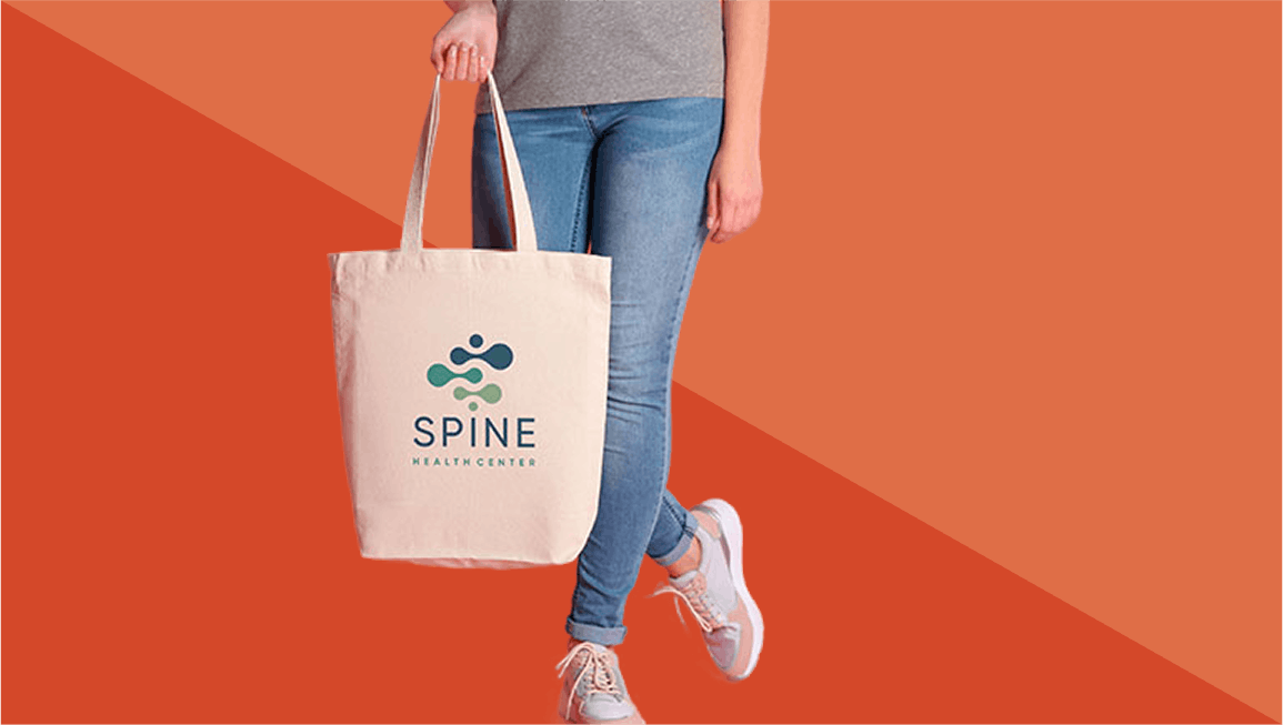 Person with a tote bag on a red background