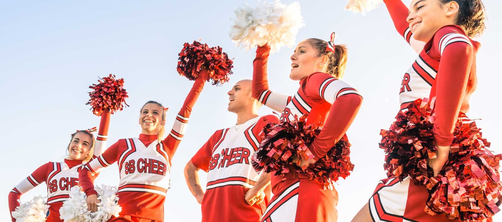 cheerleaders in red uniforms