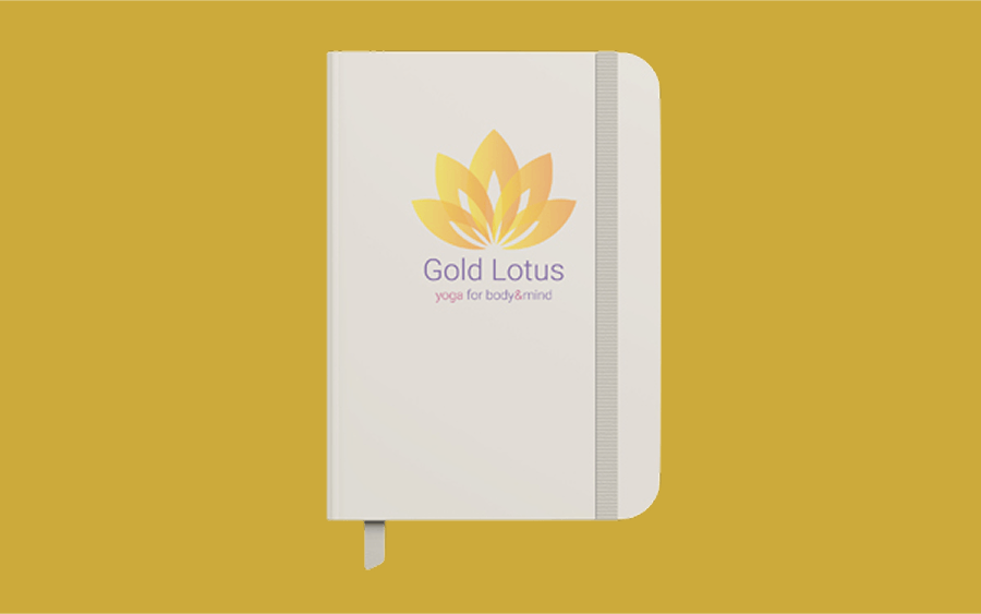 White notebook on a yellow background