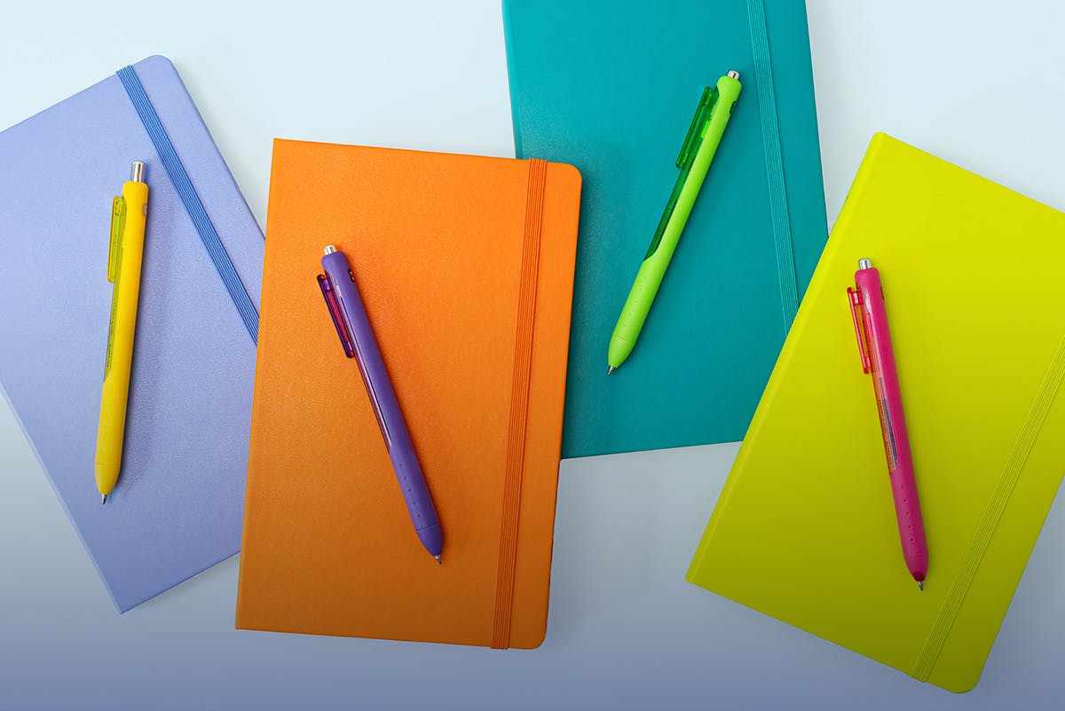 Collection of office books and pens