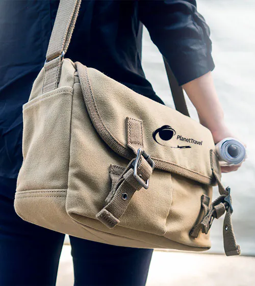 man carrying a messanger bag