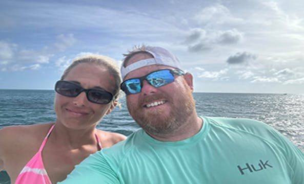 Couple taking a selfie in the ocean