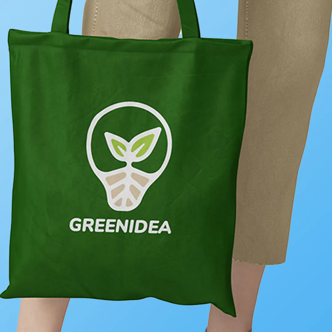 A green nonwoven tote bag with a textured grid finish featuring multi color company logo  