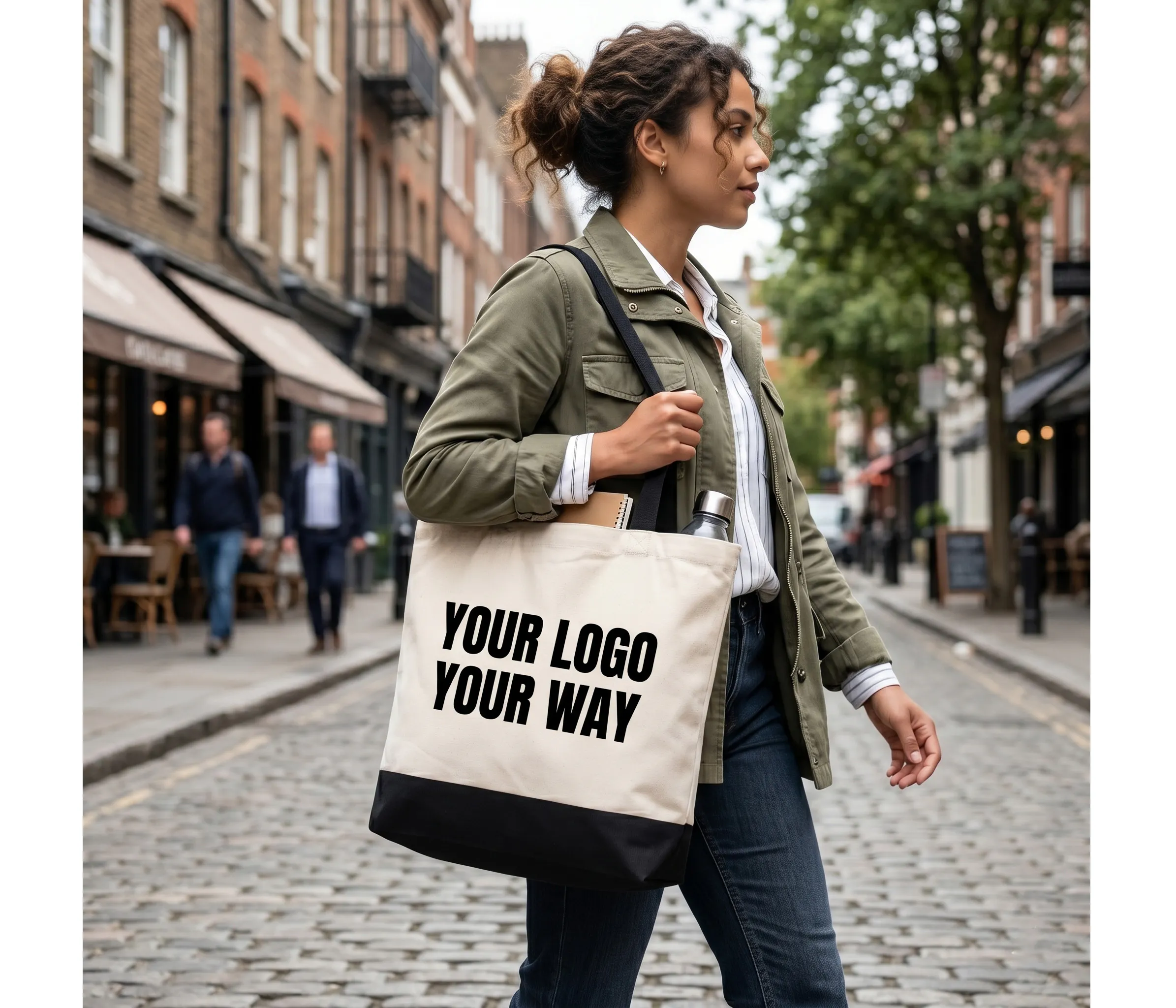 person walking with a tote bag