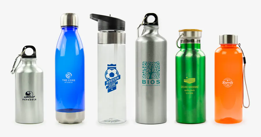 woman drinking from a reusable water bottle