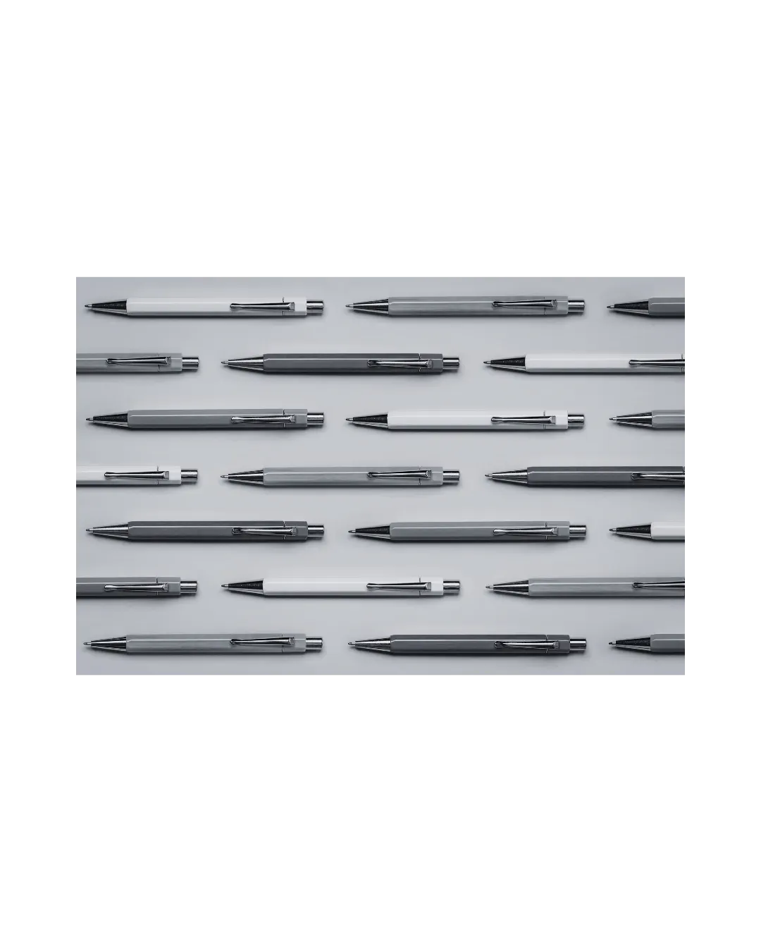 person writing with a black pen