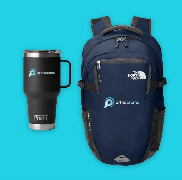black mug and navy backpack