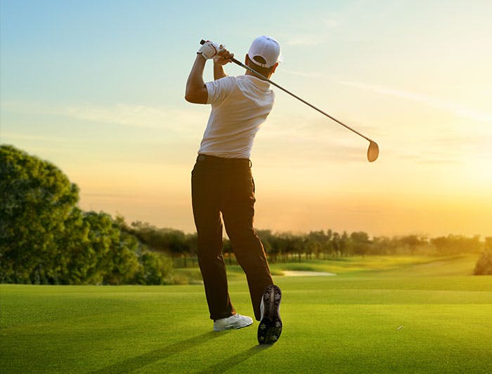 man golfing